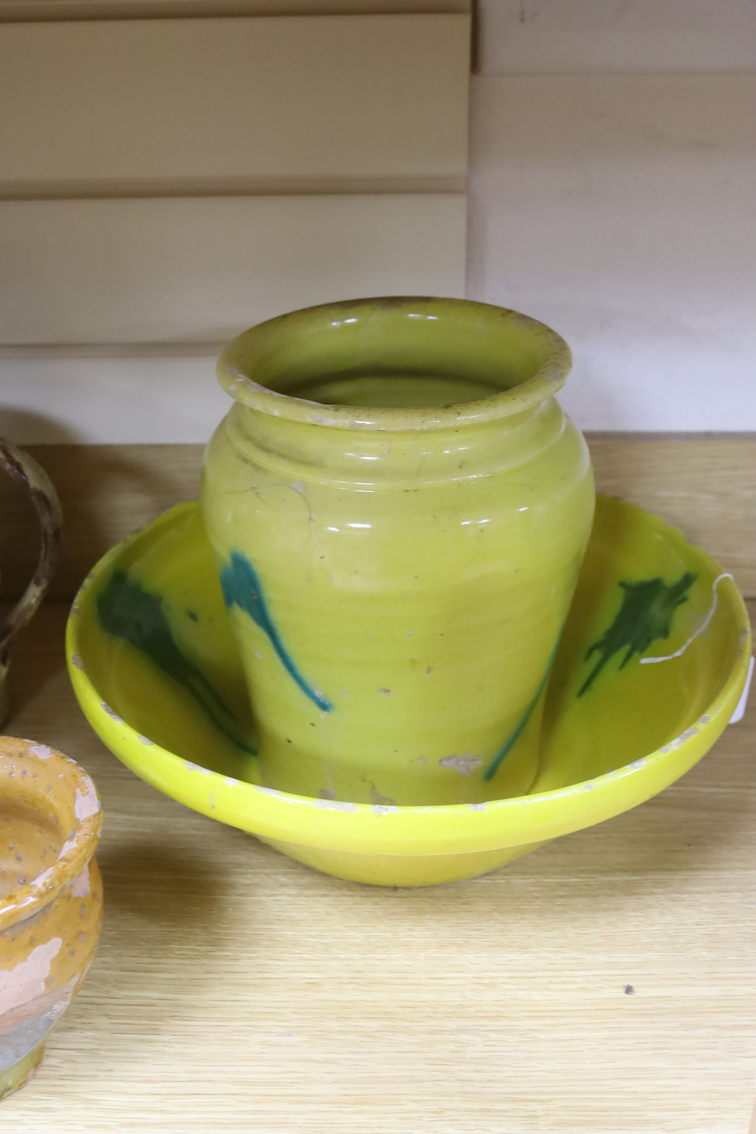 A collection of vintage French stoneware pottery, including a yellow ground bowl and matching vase, bowl 35cm